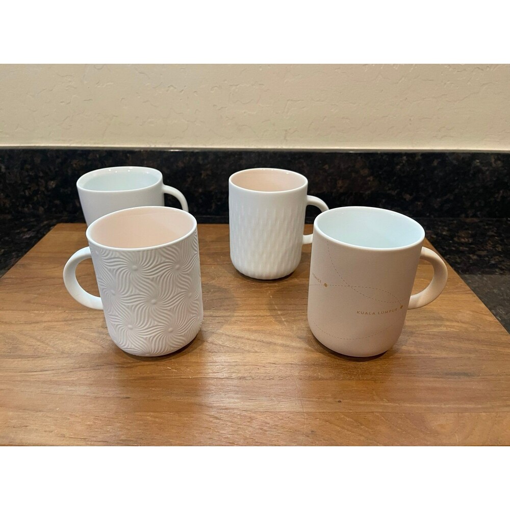 4 Nespresso Collectible Mugs